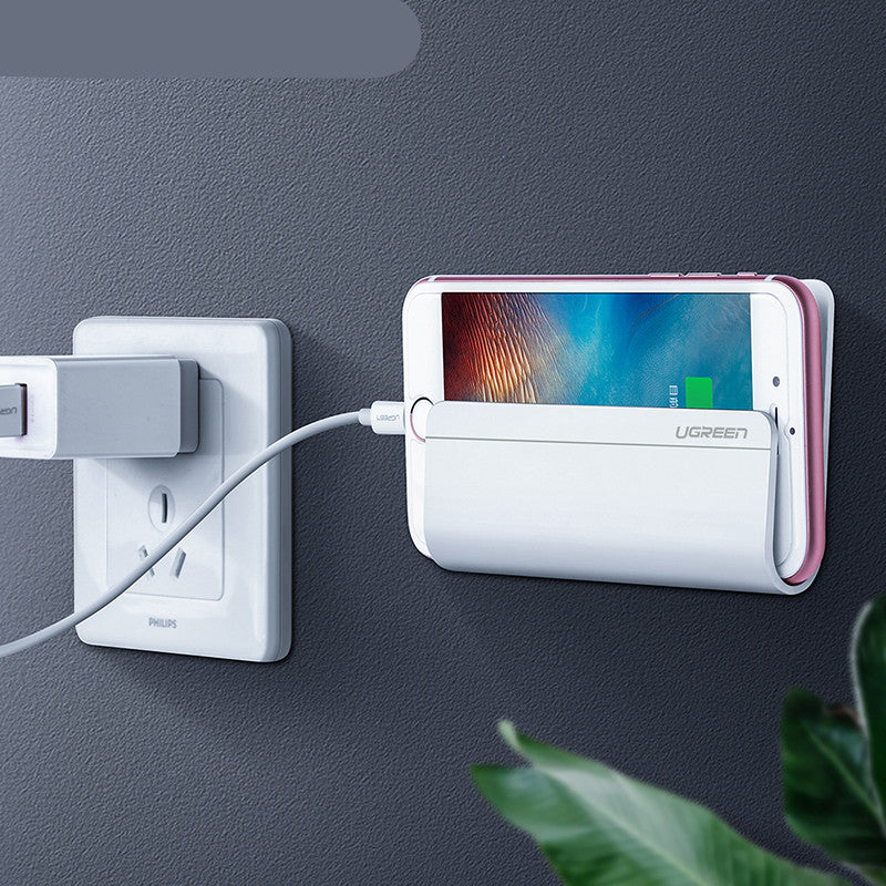 Mobile phone charging wall bracket